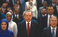 Turkey's PM Erdogan, his wife and Deputy Chairman of AK Party Sahin attend a meeting in Ankara