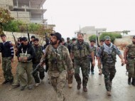 Free Syrian Army fighters are seen before they commence their patrolling and frontline duties in Binsh near Idlib