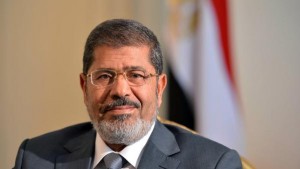 Egyptian President Mohamed Morsi looks o