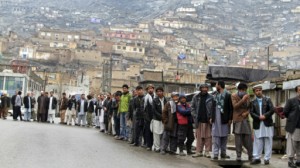 140405214711_afghan_men_line_up_outside_a_polling_station_to_cast_their_ballots_in_kabul_512x288_ap_nocredit