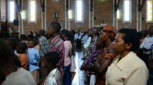 140407015259_people_pray_inside_the_saint-famille_catholic_church_on_april_6_2014_in_kigali_512x288_afp_nocredit