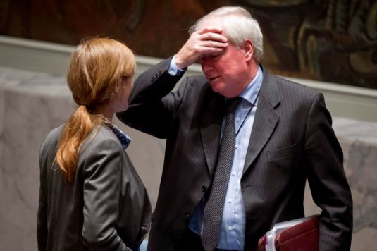 British Ambassador to the U.N. Lyall Grant speaks with U.S. Ambassador to the U.N. Power following a United Nations Security Council vote on a resolution about the ongoing crisis in Iraq at U.N. headquarters in New York