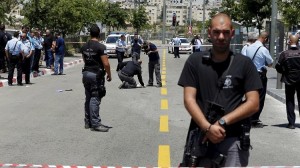 Israeli police officer stands guard at scene of attempted stabbing in Jerusalem