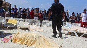 The body of a tourist shot dead by a gunman lies near a beachside hotel in Sousse, Tunisia