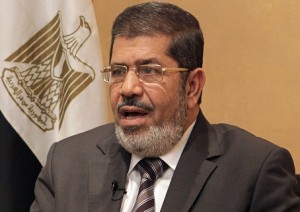 Mohamed Mursi, head of Muslim Brotherhood's political party, and Brotherhood's new presidential candidate, talks during interview with Reuters in Cairo