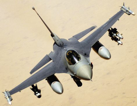 An F-16 Fighting Falcon aircraft returns to the fight after receiving fuel June 10 during a mission over Iraq. The F-16 is assigned to Balad Air Base, Iraq and is deployed from Hill Air Force Base, Utah (U.S. Air Force photo/Master Sgt. Andy Dunaway)