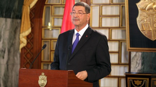 Tunisia's Prime Minister-designate Habib Essid speaks during a news conference in Tunis